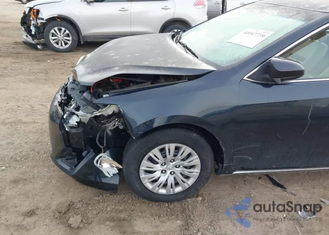 2014 Toyota Camry Le z USA, uszkodzony, nr VIN 4T4BF1FK3ER432055